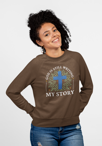 Load image into Gallery viewer, God Is Still Writing My Story Unisex Crewneck Sweatshirt (White Lettering)
